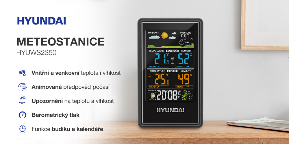 Meteorologická stanice Hyundai WS 2350 černá Domácí meteostanice Hyundai HYUWS2350 zobrazující barometrický tlak, vnitřní a venkovní vlhkost, animovanou předpověď a čas. Černý vertikální displej stojí na dřevěné polici