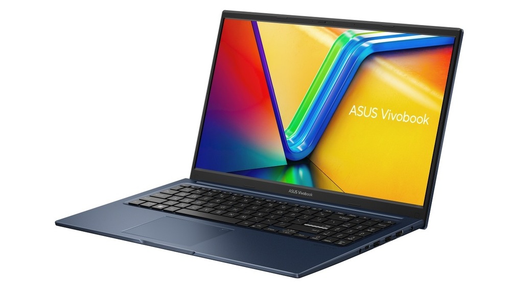 Notebook Asus Vivobook 15 stříbrný Otevřený a zapnutý notebook Asus Vivobook 15 otočený doleva