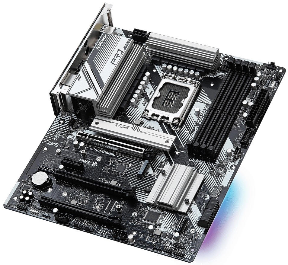 Z horního pohledu je v levé horní části zadní I/O panel s porty pro externí zařízení. Nahoře uprostřed je patice Intel 1700 a vpravo od ní čtyři DDR5 sloty. Na pravém okraji je 24pin napájení a nahoře napájení pro CPU. Uprostřed jsou PCIe sloty pro grafiku a rozšíření, poblíž jsou tři M.2 pozice a na pravé/spodní části čtyři SATA porty. Dole jsou konektory pro přední panel skříně, interní USB, audio, RGB a ventilátory.