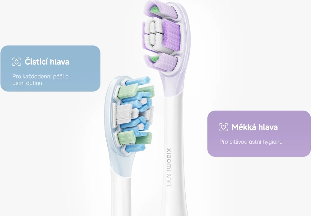 Dvě výměnné hlavice kartáčku Xiaomi MES613, modrozelená čisticí hlavice pro každodenní péči a fialová měkká hlavice určená pro citlivou ústní hygienu