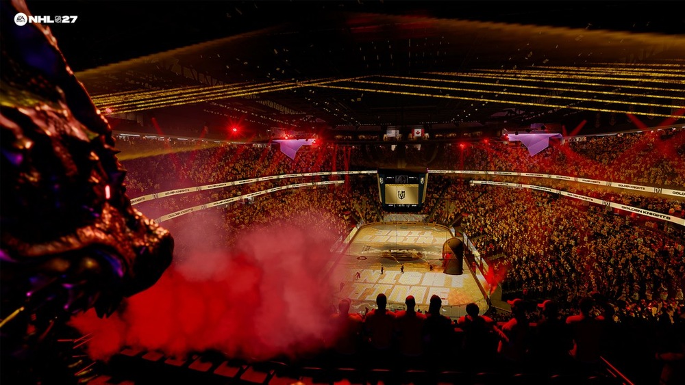 Hokejová aréna ve hře NHL 27 plná fanoušků zobrazená z ptačí perspektivy, zatímco se poblíž kluziště pod dramatickými zlatými světly zvedá červený kouř.