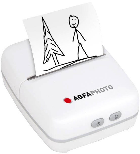 Fototiskárna AgfaPhoto Realipix Pocket P šedá Bílá termotiskárna AgfaPhoto Realipix Pocket P s čerstvým černobílým výtiskem dětské kresby postavičky a stromu.