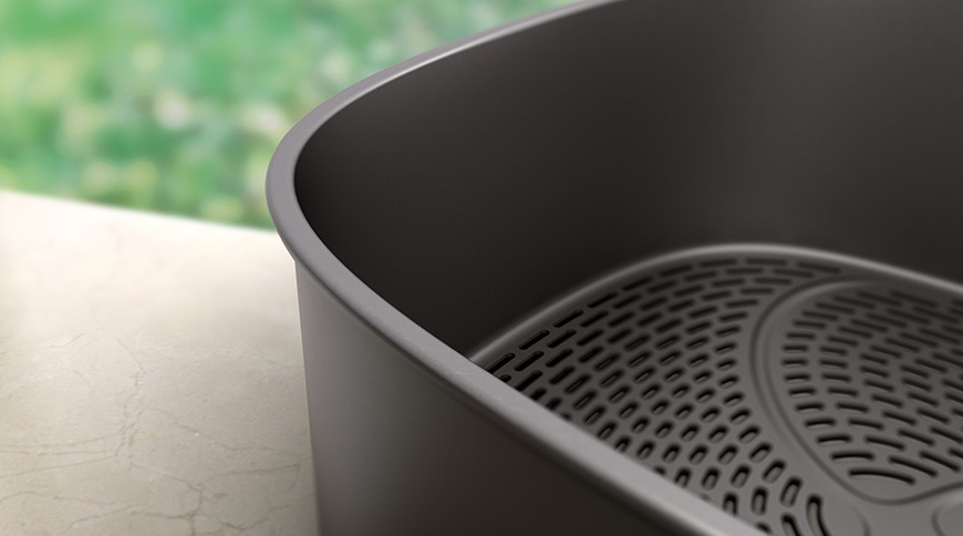 Fritéza horkovzdušná Philips Airfryer Dual Basket s párou 9,5 l NA565/02 černá/stříbrná Detailní záběr na část horkovzdušné fritézy Philips.