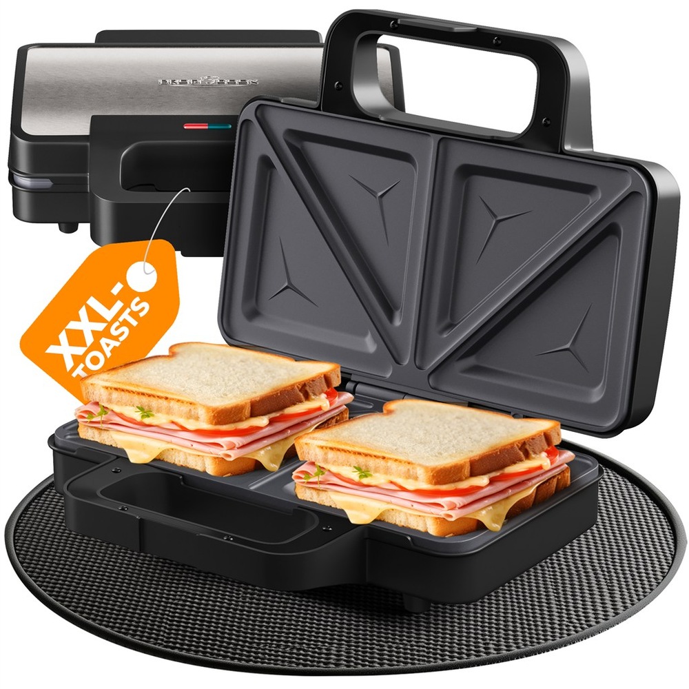 Sendvičovač Profi Cook ST 1315 nerez otevřený XXL sendvičovač ProfiCook ST 1315 s nepřilnavými deskami na 4 trojúhelníkové toasty
