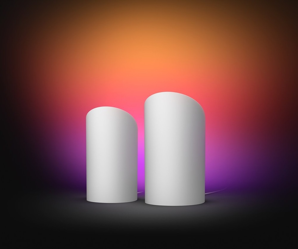Stolní svítidlo Philips Hue Wall washer, 20W, EU/UK, White and Color Gradient (2 ks) bílá Lampičky Philips Hue Wall washer s ukázkou projekce na stěnu, vytvářející příjemnou atmosféru