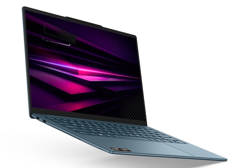 Notebook Lenovo Yoga Slim 7 14AGP11 modrý Otevřený a zapnutý notebook Lenovo Yoga Slim 7 14AGP11 otočený doprava