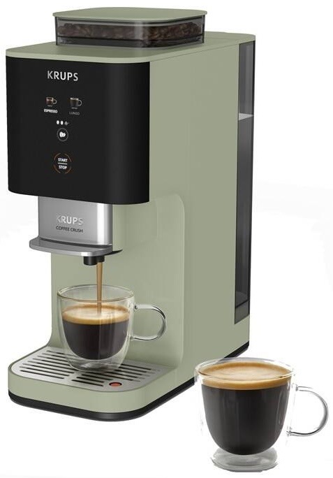 automatický kávovar Krups Coffee Crush SA401LE0 v zeleném provedení na kuchyňské lince s připravovaným espressem do skleněného hrnku