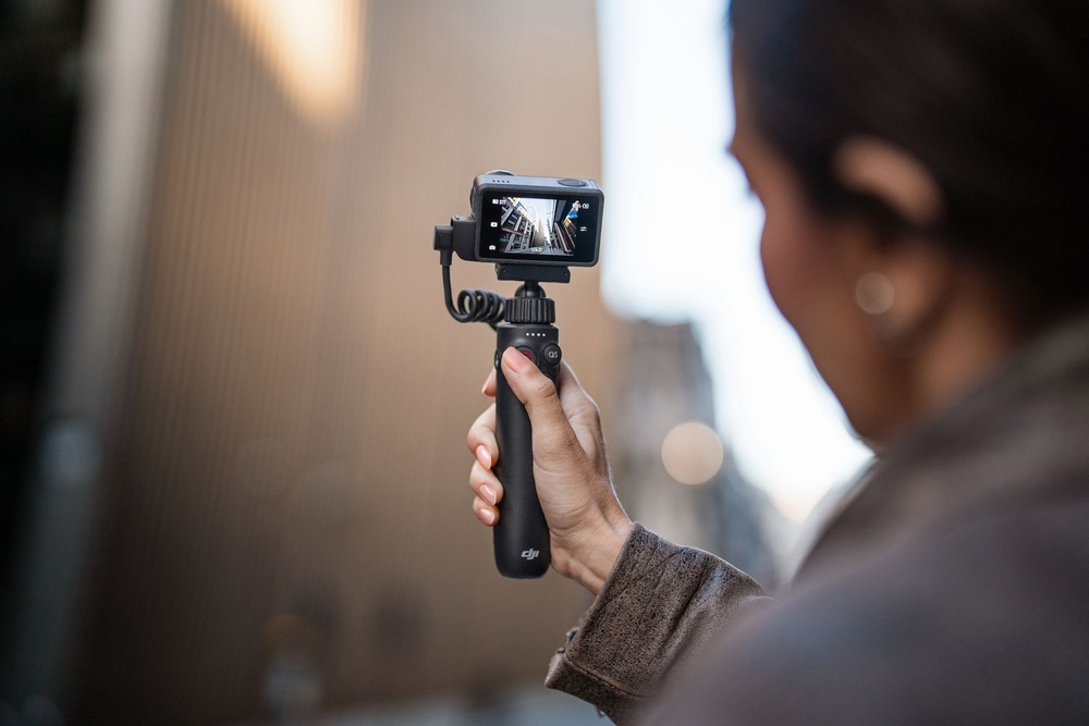 Držák DJI Osmo Action Multifunctional Charging Handle černý Držák DJI Osmo Action Multifunctional Charging Handle černý