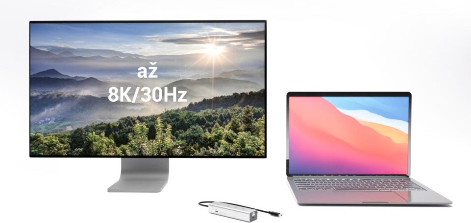 Na obrázku je reklamní grafika k USB-C hubu i-tec. Vlevo je velký monitor se záběrem horské krajiny při východu nebo západu slunce a přes obraz je napsáno „až 8K/30Hz“. Vpravo je otevřený notebook s barevnou tapetou a mezi nimi dole leží malý stříbrný hub připojený kabelem. Nahoře je český nápis „Křišťálově čisté video s ultra vysokým rozlišením“. Obrázek zdůrazňuje, že hub umožňuje připojit externí displej ve velmi vysokém rozlišení.