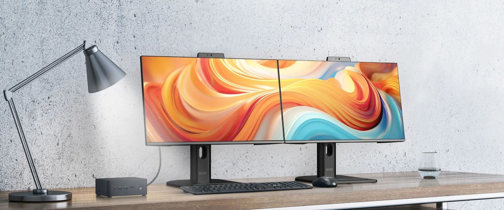 Monitor MSI PRO MP245PDG E14 černý Monitor MSI PRO MP245PDG E14 s barevným obrazem na pracovním stole