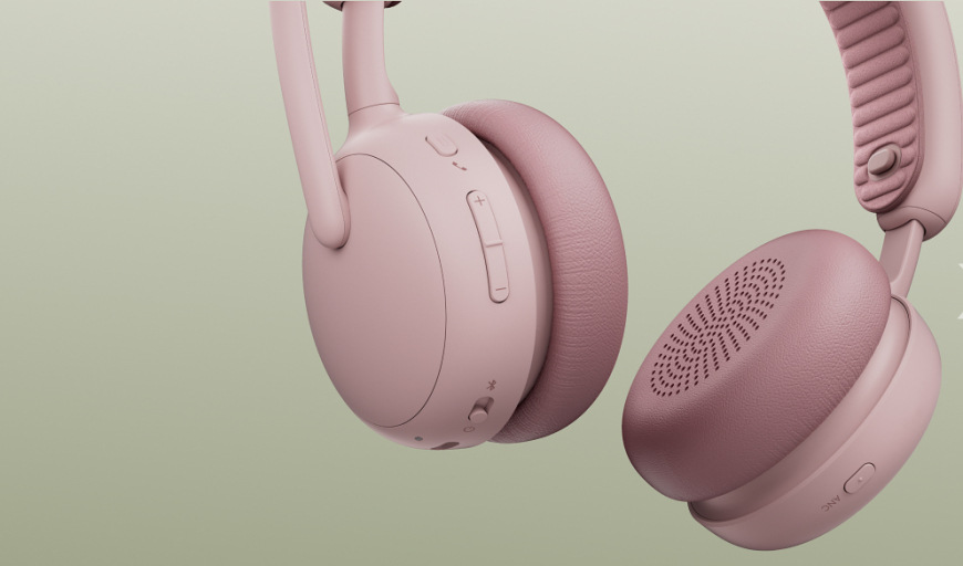Headset Logitech Zone Wireless 2 ES růžový Detailní záběr na náušníky headsetu Logitech Zone Wireless 2 ES s viditelnými ovládacími tlačítky hlasitosti a přepínačem ANC