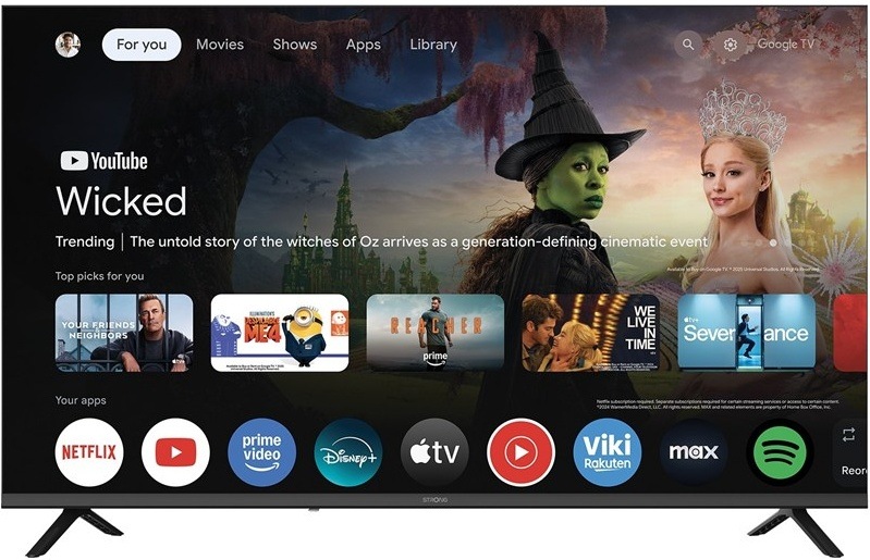 Televizor Strong Google TV s domovskou obrazovkou a ikonami streamovacích aplikací.