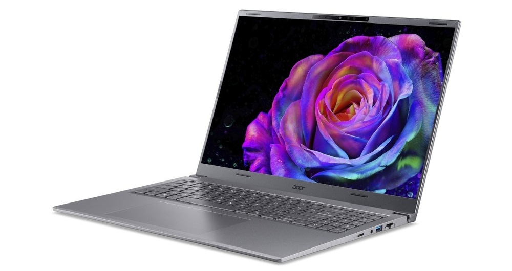 Notebook Acer Aspire X 16 AI (AX16-I71M-96F0) šedý Otevřený a zapnutý notebook Acer Aspire X 16 AI (AX16-I71M-96F0) otočený doleva