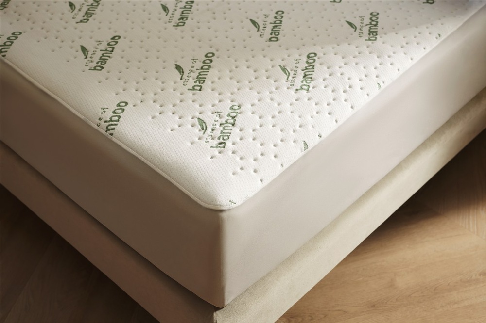 Vyhřívací podložka Duux DXUB30 Snooze Bamboo 200 x 90 cm bílá Detail vyhřívané podložky Duux na posteli