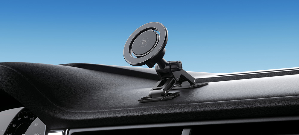 Držák na mobil GoGEN MCH504, s podporou MagSafe černý Magnetický držák na mobil do auta GoGEN MCH504, připevněný na palubní desce nad volantem. Držák má nastavitelné rameno a černou magnetickou plochu pro upevnění telefonu