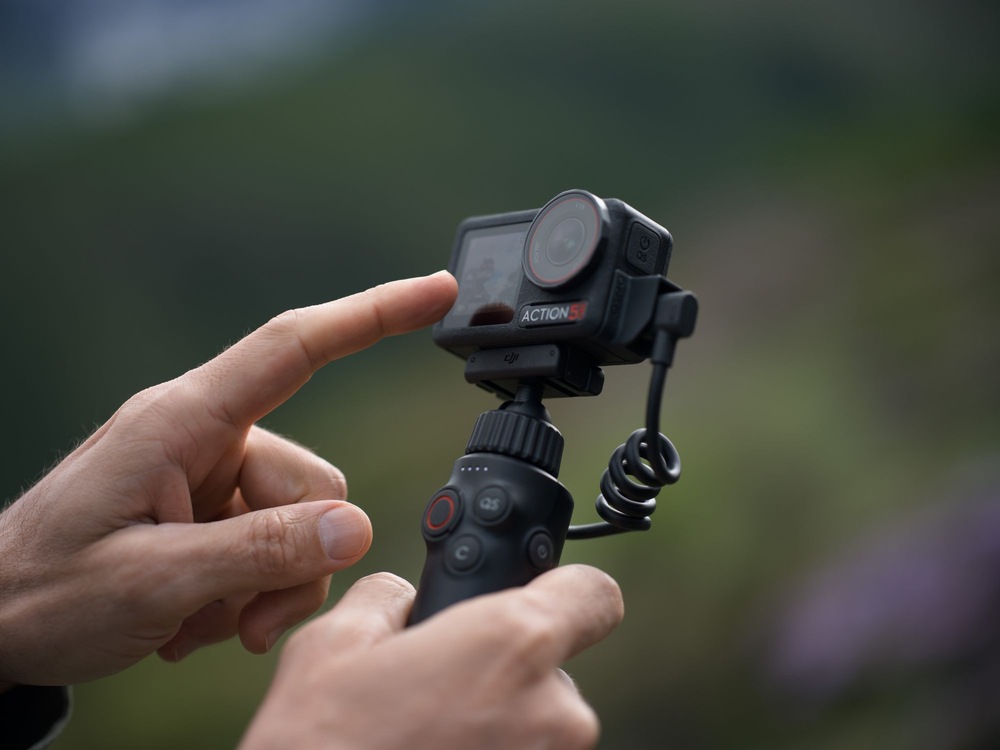 Držák DJI Osmo Action Multifunctional Charging Handle černý Držák DJI Osmo Action Multifunctional Charging Handle černý