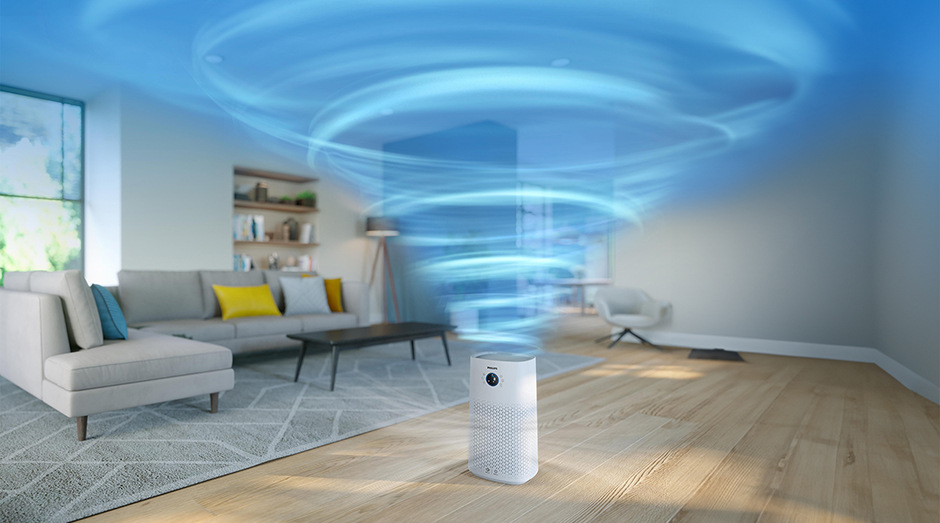 Čistička vzduchu Philips AC3737/10 Series 3000 vypouštějící vír v obývacím pokoji, znázorňující čištění