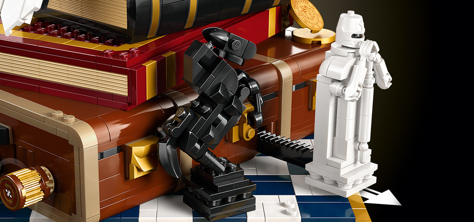 Stavebnice LEGO® Harry Potter™ 76466 Kámen mudrců – sběratelská edice Harryho kufr ukrývá tři filmové scény, které můžete aktivovat pomocí otočných koleček a objevovat skryté detaily.