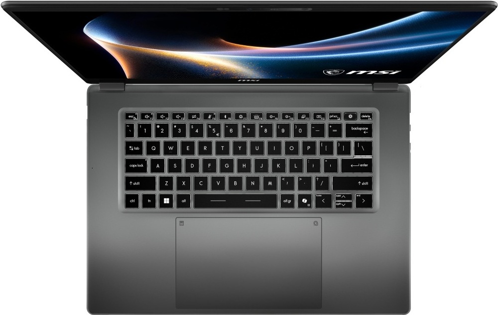 Notebook MSI Prestige 16 AI+ C3MG-240CZ šedý Pohled shora na klávesnici notebooku MSI Prestige 16 AI+ s velkým touchpadem a kompaktním rozložením kláves