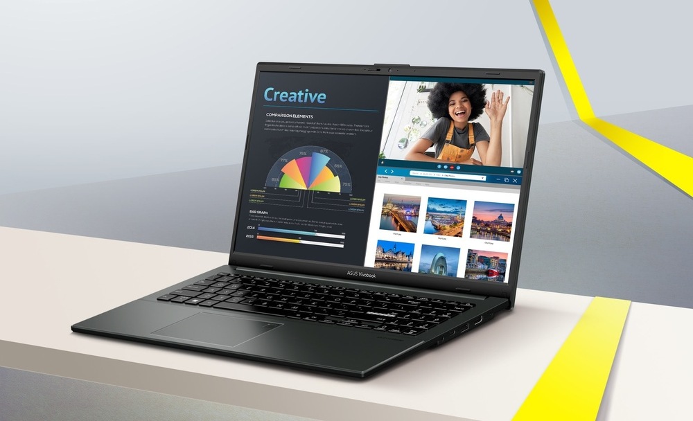 Notebook ASUS Vivobook Go 15 při videohovoru a práci ve více otevřených oknech