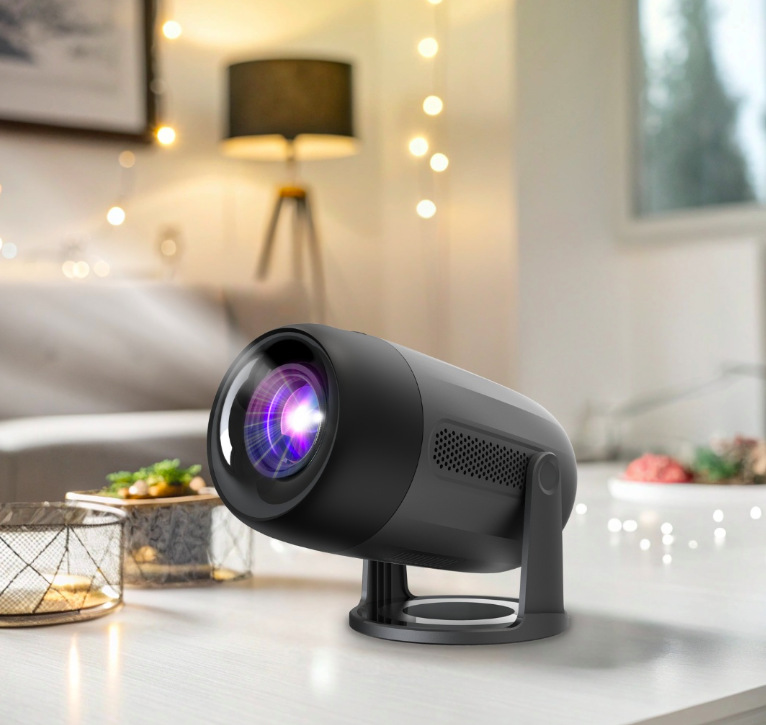 Projektor Philips NeoPix 150 LCD Full HD v černém provedení umístěný na stole v interiéru