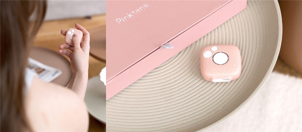 Elektrostimulátor Bluetens Pinktens růžový Detailní pohled na kulatý růžový modul Pinktens a část růžové krabičky na podnose