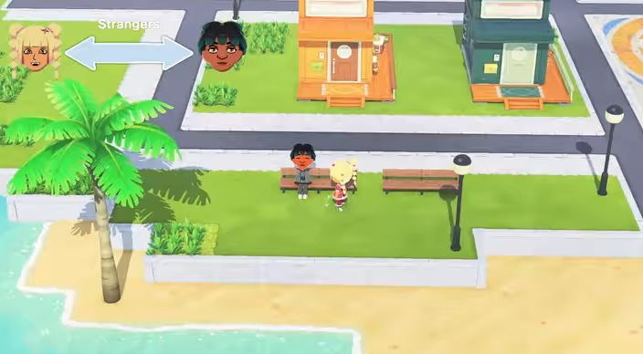 Scéna ze hry Tomodachi Life Living the Dream zobrazuje dvě postavy na travnaté ploše u pláže. V pozadí jsou dva malé domy. Vidíme palmu a lavičku.