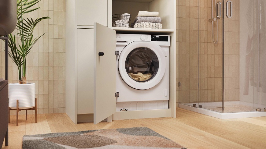 Vestavná pračka Candy BC4S68M6D8J-S bílá pračka Candy BC4S68M6D8J-S zabudovaná ve skříni, uvnitř je prádlo