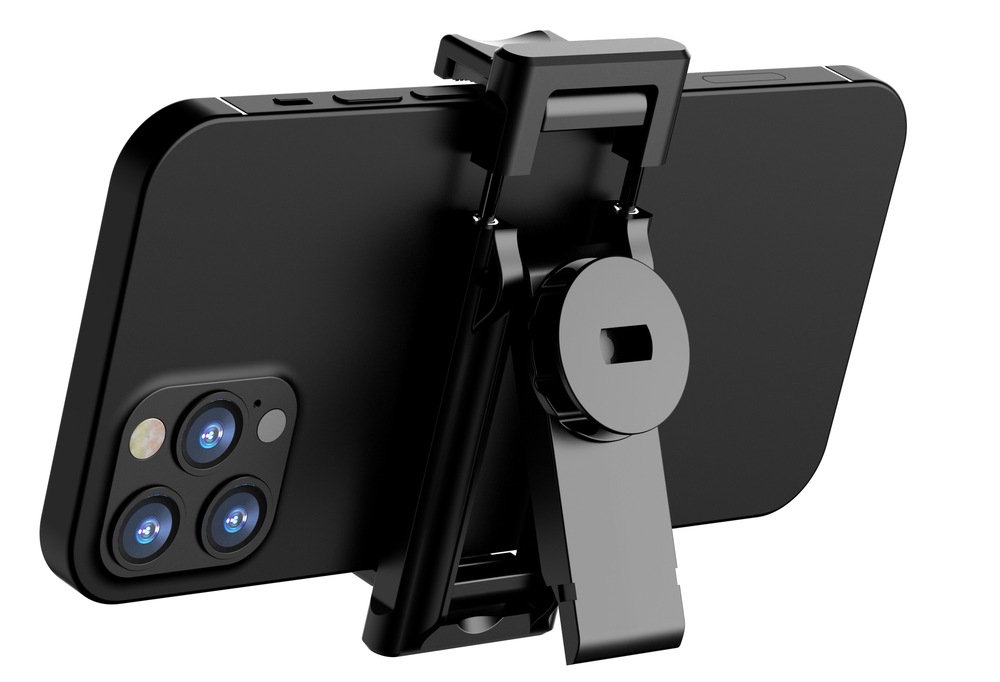 Selfie tyč GoGEN 6 teleskopická, bluetooth černá Detailní pohled na odnímatelný a otočný clip selfie tyče GoGEN 6 držící chytrý telefon z zadní strany