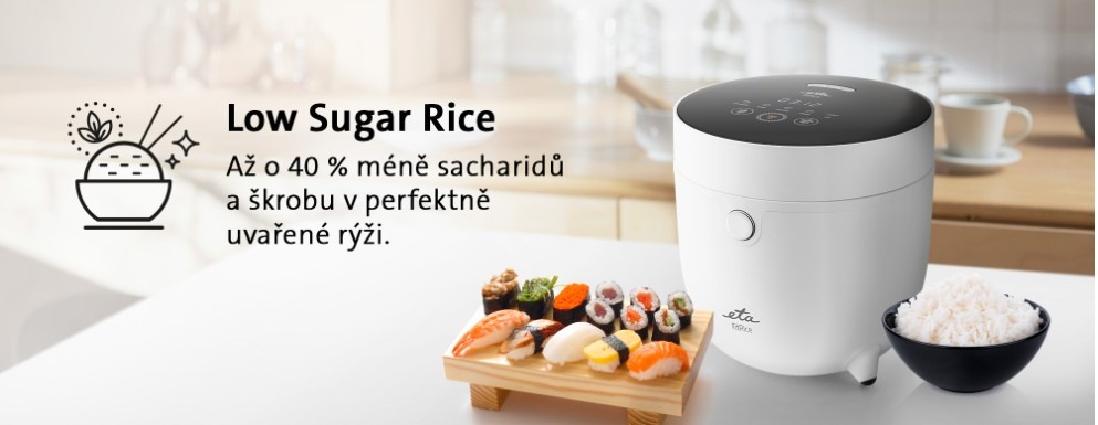 Rýžovar ETA Fit Rice Low Sugar 4139 90000 bílý Bílý rýžovar ETA FitRice Low Sugar na bílé kuchyňské lince vedle misky uvařené rýže a deskou se sushi, vlevo popsána funkce Low Sugar Rice: až o 40% méně sacharidů a škrobu v perfektně uvařené rýži