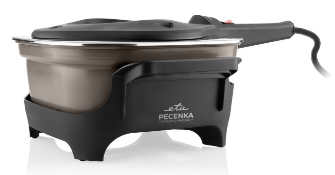 Pohled zboku na Pečenku ETA Ceramic Natura s šedou keramickou nádobou, umístěnou v černém podstavci se zavřeným víkem