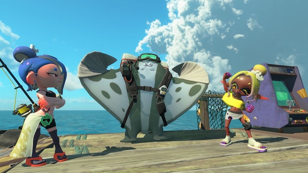 Záběr ze hry Splatoon Raiders se dvěma postavami a bojovým rejnokem stojícími na palubě lodi.