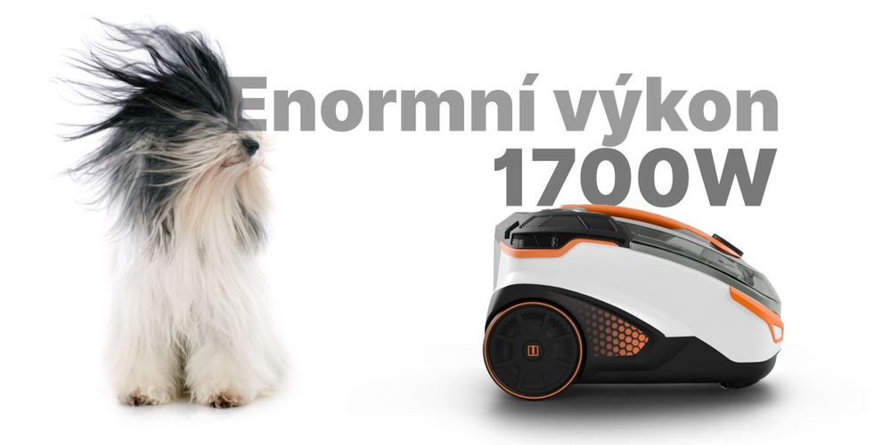 Bezsáčkový vysavač Thomas Amfibia PRO Animal, vedle něj sedí pes, jehož srst vlaje v proudu vzduchu za vysavačem, nápis Enormní výkon 1700 W
