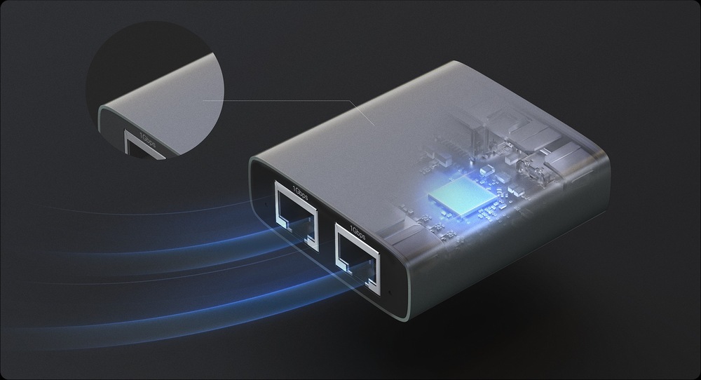 Elegantní obdélníkové digitální zařízení se dvěma ethernetovými porty vyzařuje modré vlny, které naznačují připojení. Detailní záběr ukazuje složitou vnitřní obvodovou soustavu.