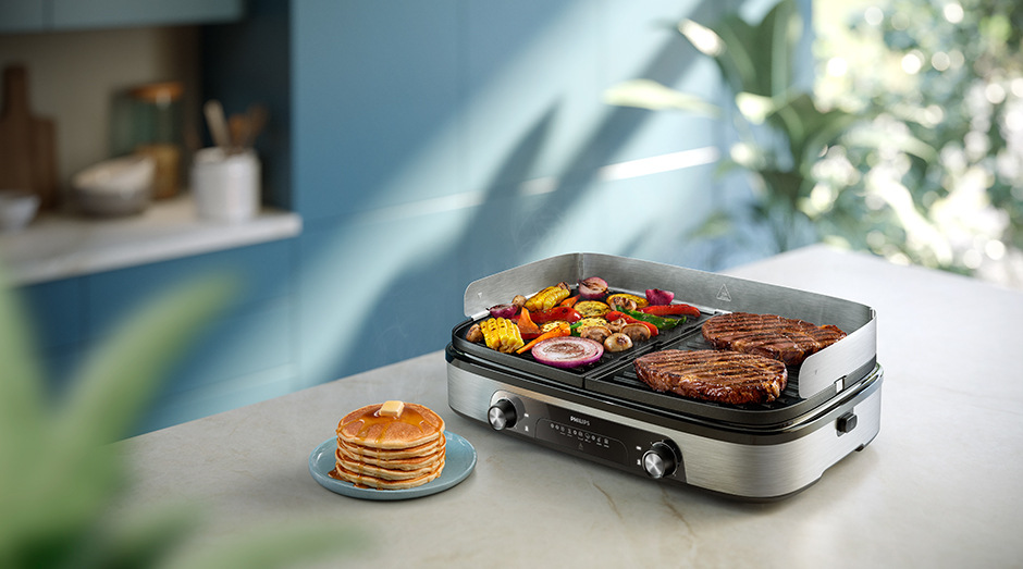 Pokrmy připravující se v kuchyni na grilu Philips HD6222/90