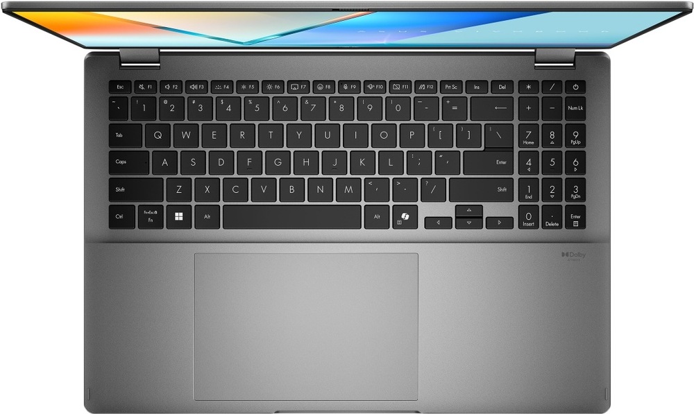 Pohled shora na klávesnici notebooku Asus Vivobook 16 Flip s prostorným touchpadem
