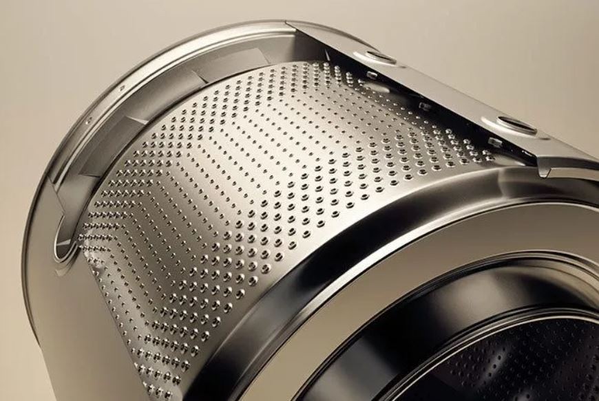 Detail nerezoveho bubnu pračky ASKO W5096RG, který je odolnější a hygieničtější.