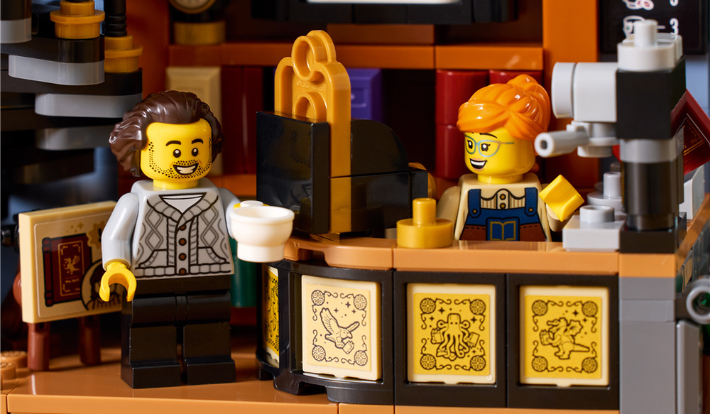 Minifigurky LEGO spisovatelky a čtenáře oživují knihkupectví a poskytují prostor pro vymýšlení vlastních příběhů.