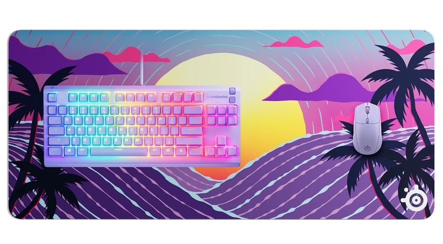 Podložka pod klávesnici a myš SteelSeries QcK XXL Neon Sunset fialová Podložka QcK XXL Neon Sunset při pohledu shora s podsvícenou klávesnicí a myší