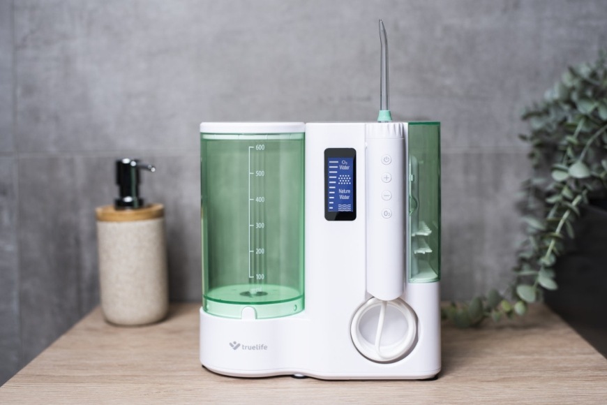 Ústní sprcha TrueLife AquaFloss Station O300 Ozone bílá/zelená TrueLife AquaFloss Station O300 Ozone, bílá/zelená