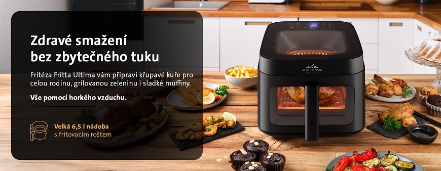 Horkovzdušná fritéza ETA Fritta Ultima pro zdravé smažení bez tuku a 6,5 l nádobou na kuchyňské lince s připraveným jídlem – kuřetem, hranolky, zeleninou a muffiny