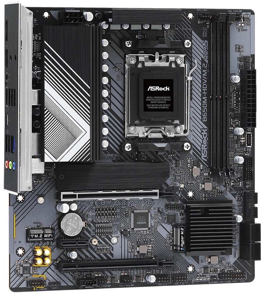 Základní deska ASRock B650M-HDV/M.2 Shora vidíte micro ATX desku s blokem zadních portů vlevo nahoře. Uprostřed je patice procesoru AM5, po pravém okraji jsou 2 sloty pro DDR5 a 24pin napájení. Dole jsou dlouhé PCIe sloty pro grafiku, mezi nimi a paticí bývají M.2 pozice pro SSD a u spodní pravé části konektory SATA.