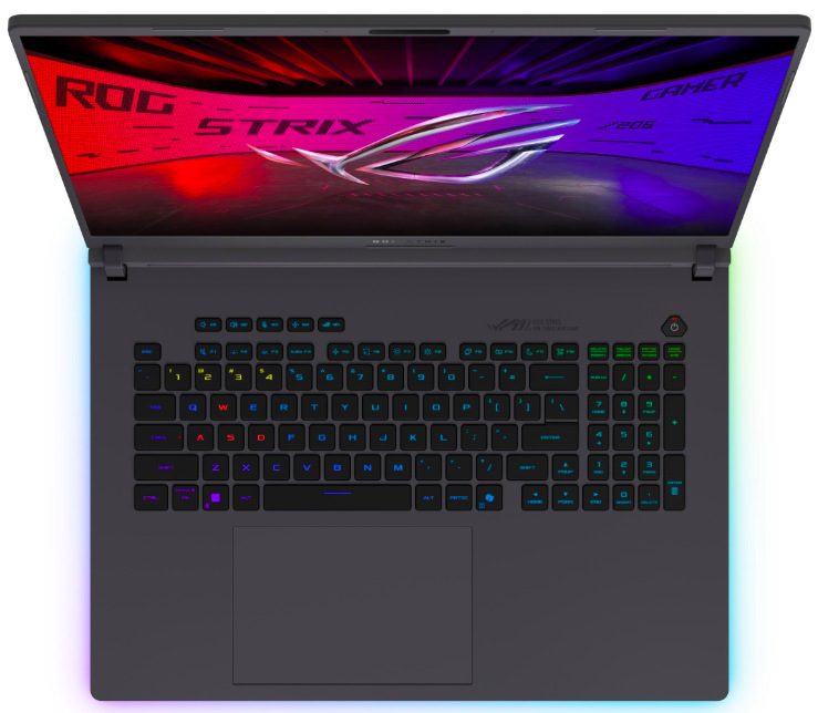 Pohled shora na RGB klávesnici s numerickou částí a velký touchpad notebooku