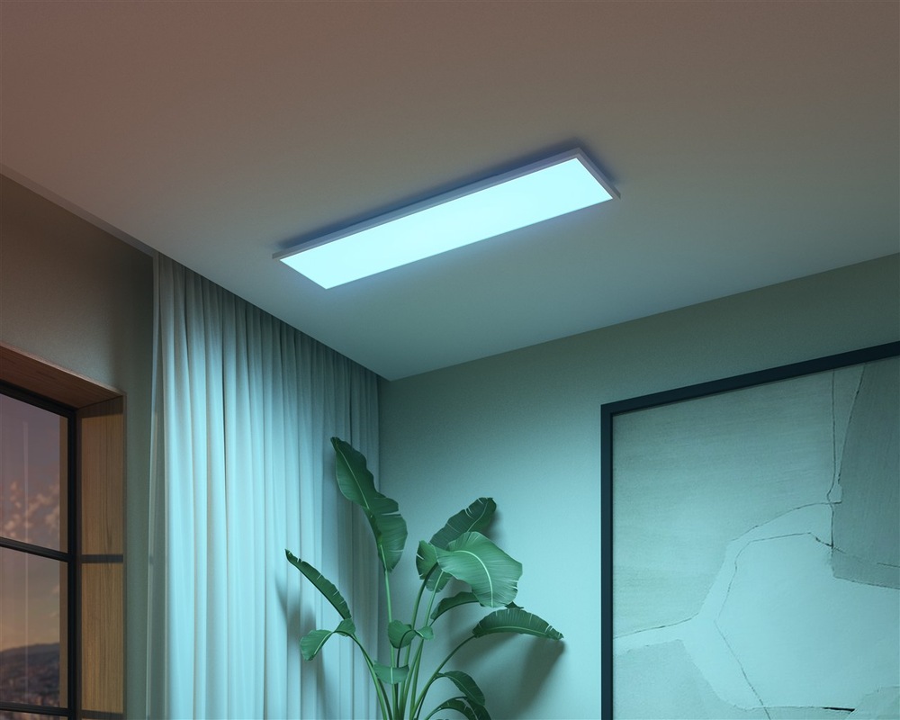 Stropní svítidlo Philips Surimu Hue Panel, 60W, 120x30 cm, White and Color Ambiance bílé Ukázka nasvícení rohu pokoje pomocí Philips Surimu Hue