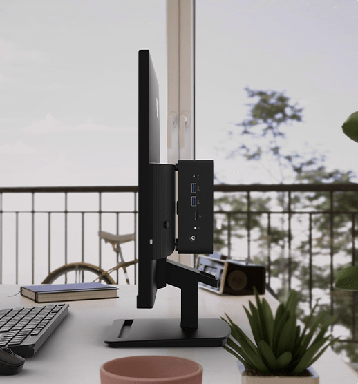 Boční pohled na monitor MSI PRO MP241 E14V s mini PC upevněným na zadní straně