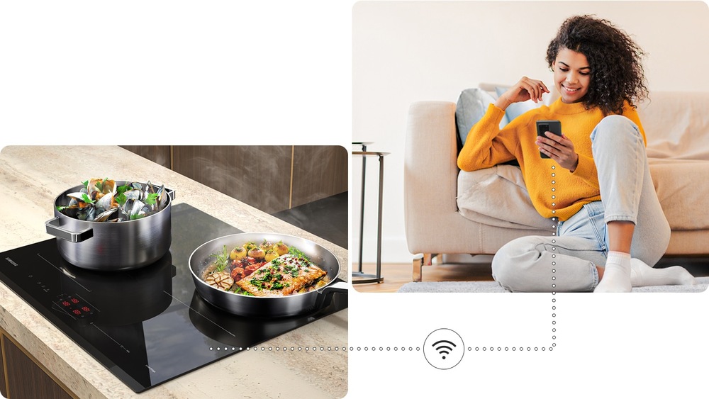 Varná deska indukce Samsung NZ64B6056GK/U2 s chystaným jídlem, žena používající mobilní telefon - aplikace SmartThings