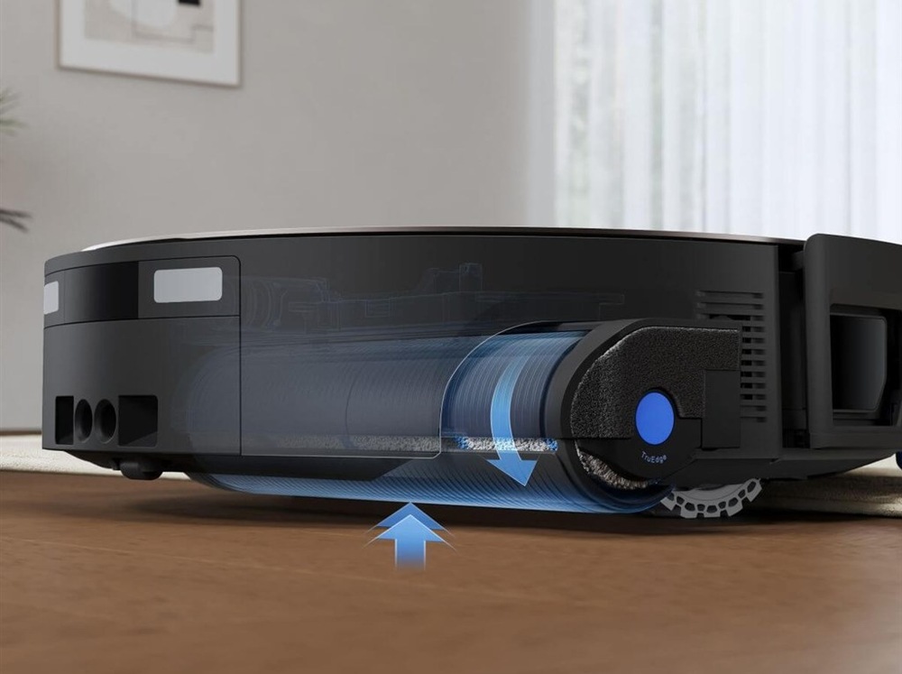 Robotický vysavač Ecovacs DEEBOT X12S OMNICYCLONE GOLD zlatý Obrázek znázorňuje, že jakmile se robot dostane na koberec, automaticky se zvedne mopovací válec. A to i obráceně - pokud narazí na rozlité tekutiny, vytáhnou se kartáče, aby se nenamočily štětiny.