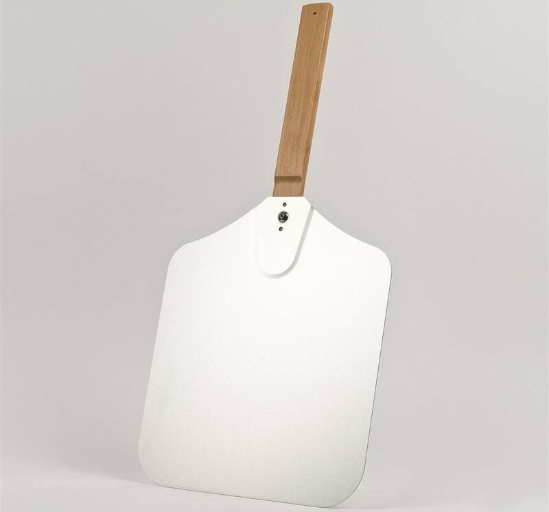 Mini trouba G3 Ferrari G1020400 černá/stříbrná Obrázek lopaty na pizzu o průměru 30 cm pro snadné vkládání a vyjmutí pizzy.