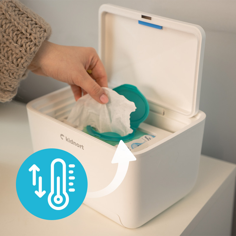 Ohřívač vlhčených ubrousků Kidnort Lykkelig DE-030447 bílý Ohřívač ubrousků Kidnort zajišťuje optimální teplotu