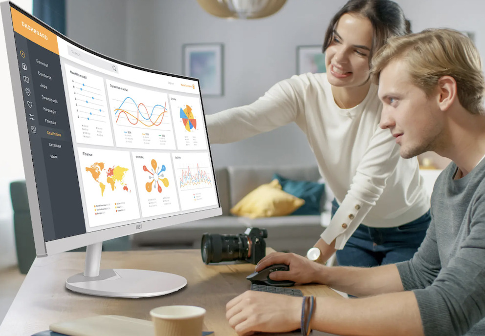 Monitor MSI PRO MP341CQW E12 bílý Monitor MSI PRO MP341CQW E12 při práci s grafy a přehledy na široké zakřivené obrazovce